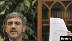 Former Iranian diplomat Hussein Alizadeh at a news conference in Helsinki on September 13